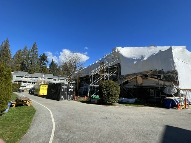 Scaffolding and weather containment around a 20-unit North Vancouver multi-family building